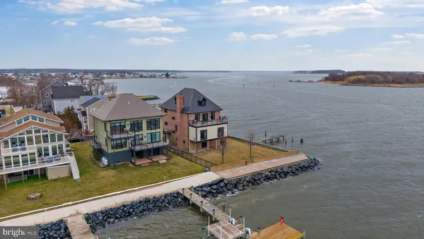 a view of a house with a ocean view