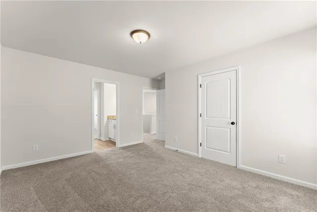 an empty room with an entryway