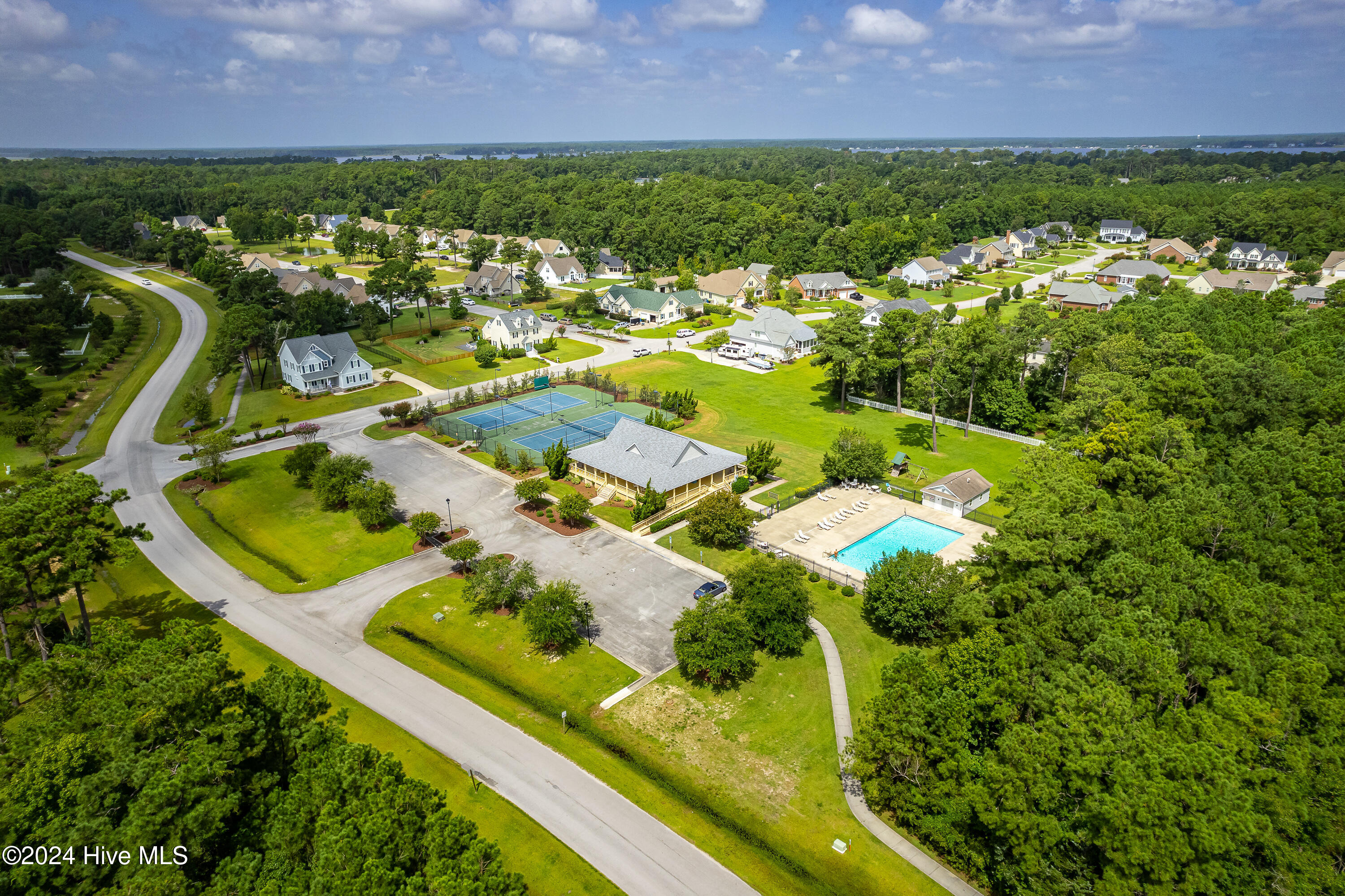 1602 Razorbill Court Morehead City, NC 28557 - Photo 59 of 62 Community clubhouse, pool and tennis courts