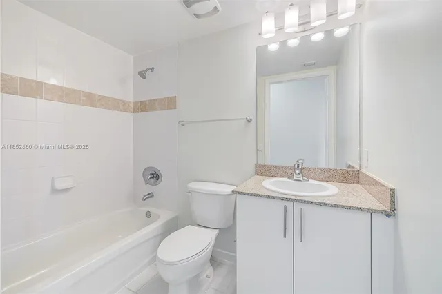 a view of a house with backyard porch and sitting area