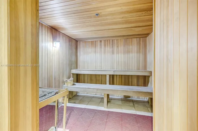 a room with furniture and a large window