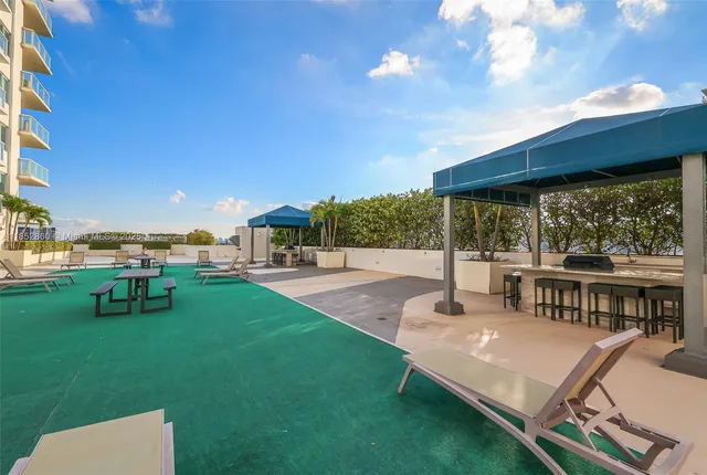 a view of a city with tall buildings