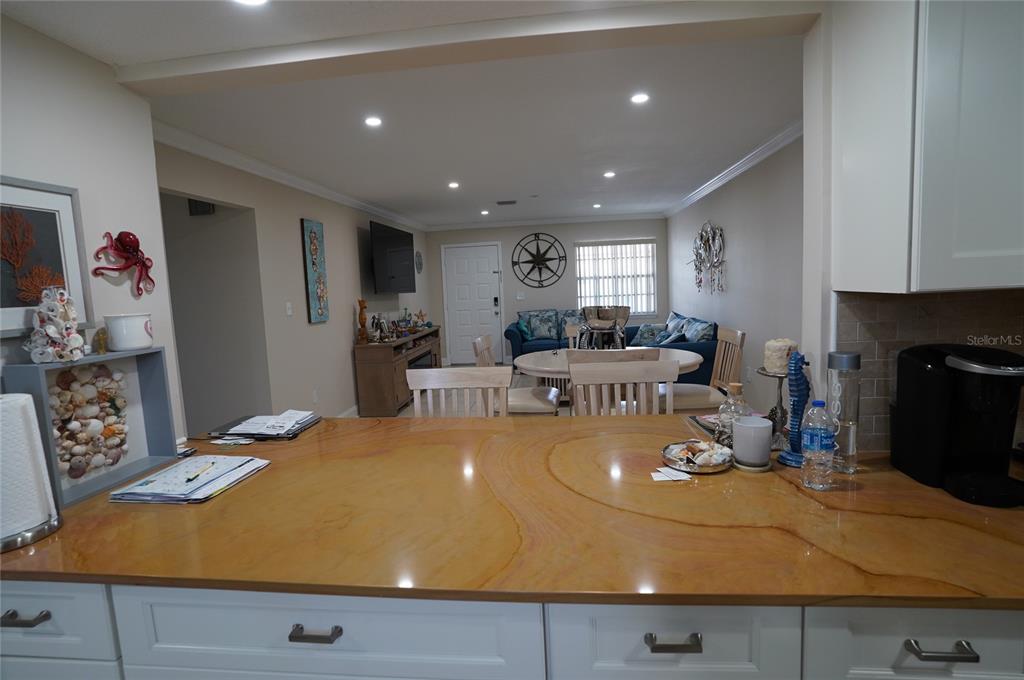 1531 Placida Road, Unit 204 Englewood, FL 34223 - Photo 11 of 52 a view of a dining room with furniture