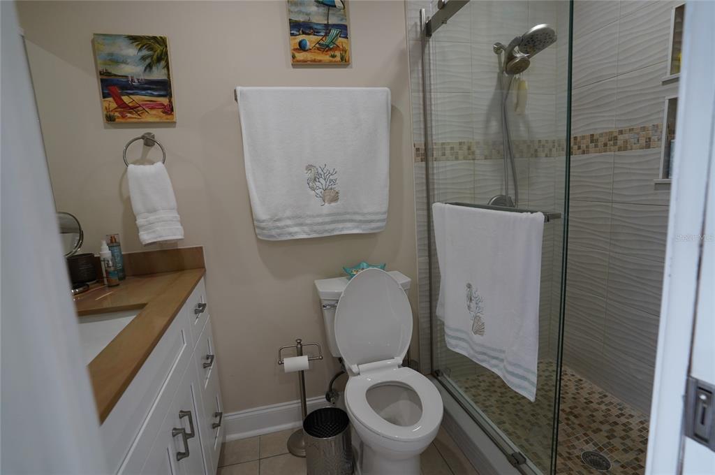 1531 Placida Road, Unit 204 Englewood, FL 34223 - Photo 17 of 52 a bathroom with a toilet and a sink