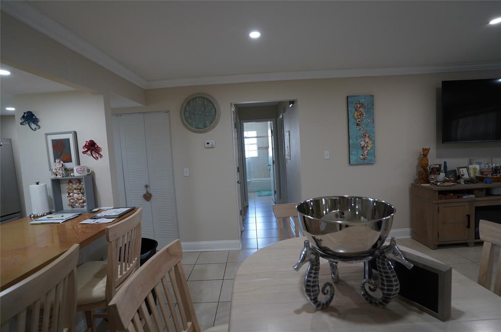 1531 Placida Road, Unit 204 Englewood, FL 34223 - Photo 8 of 52 a workspace with furniture and kitchen