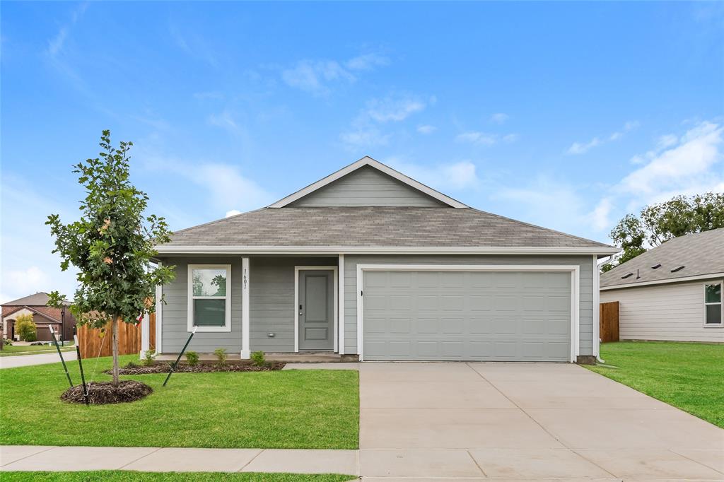 1601 Parlier Street McKinney, TX 75071 - Photo 1 of 29 a front view of a house with a yard and garage