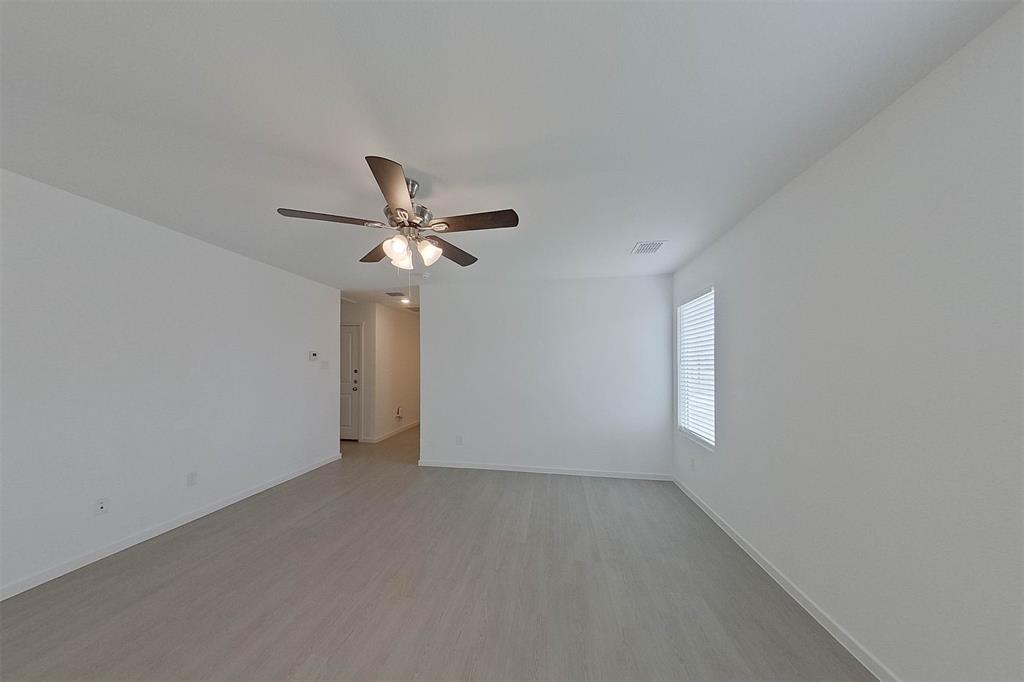 1601 Parlier Street McKinney, TX 75071 - Photo 11 of 29 a view of empty room with ceiling fan