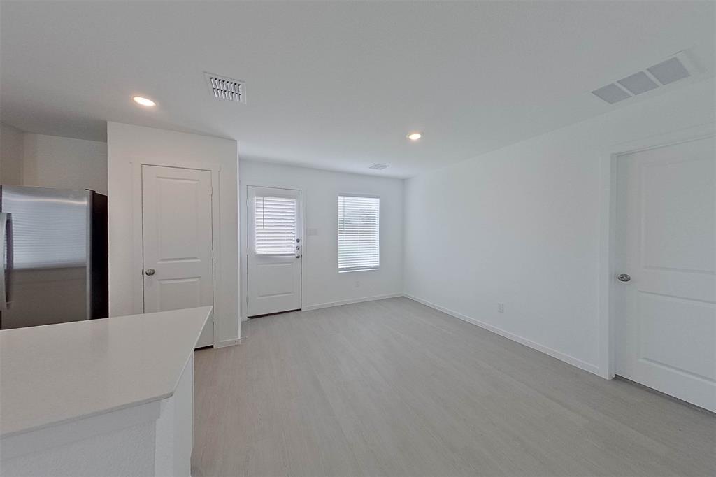 1601 Parlier Street McKinney, TX 75071 - Photo 12 of 29 a view of an empty room with a window
