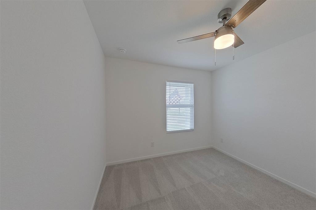 1601 Parlier Street McKinney, TX 75071 - Photo 16 of 29 an empty room with a window