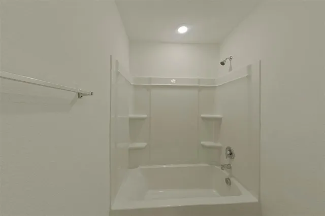 a bathroom with a bathtub