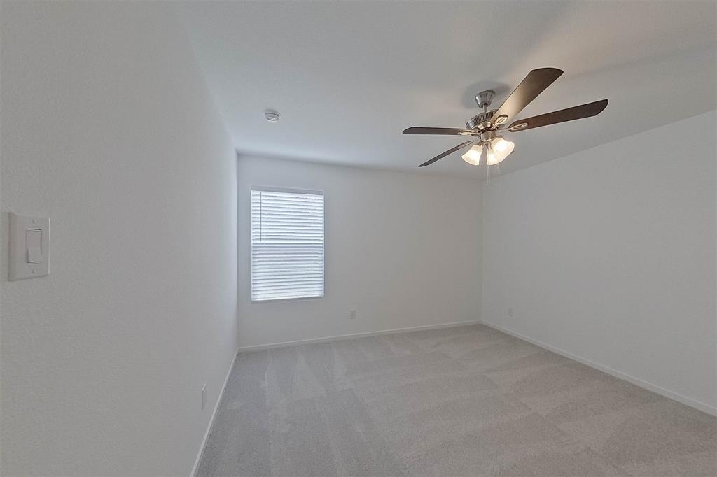 1601 Parlier Street McKinney, TX 75071 - Photo 21 of 29 an empty room with a window