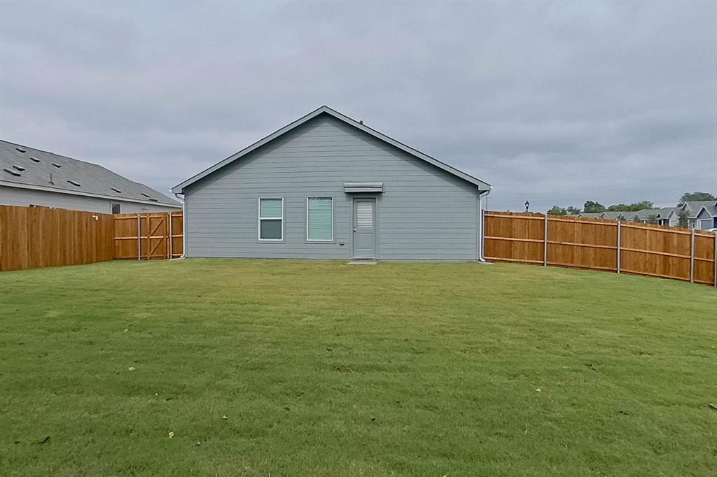 1601 Parlier Street McKinney, TX 75071 - Photo 28 of 29 a view of a backyard with a garden