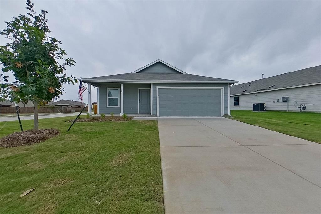 1601 Parlier Street McKinney, TX 75071 - Photo 29 of 29 a view of a house with a yard and large tree