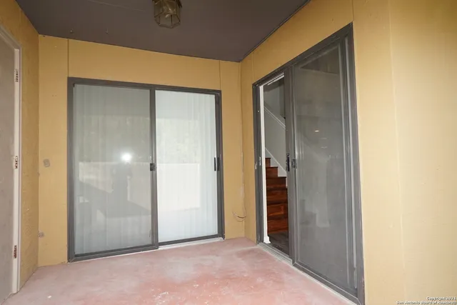 a view of a swimming pool with a garden