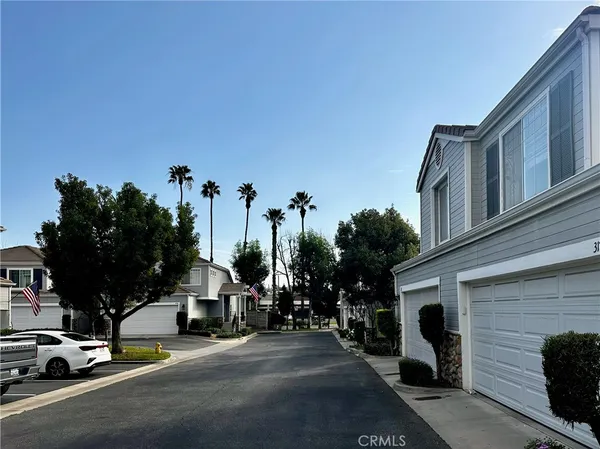 a view of a street with cars