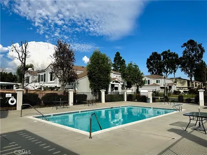 a view of a house with swimming pool