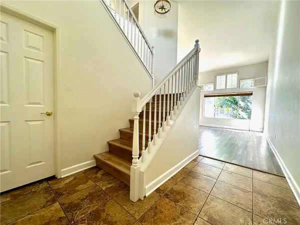 a view of an entryway with staircase