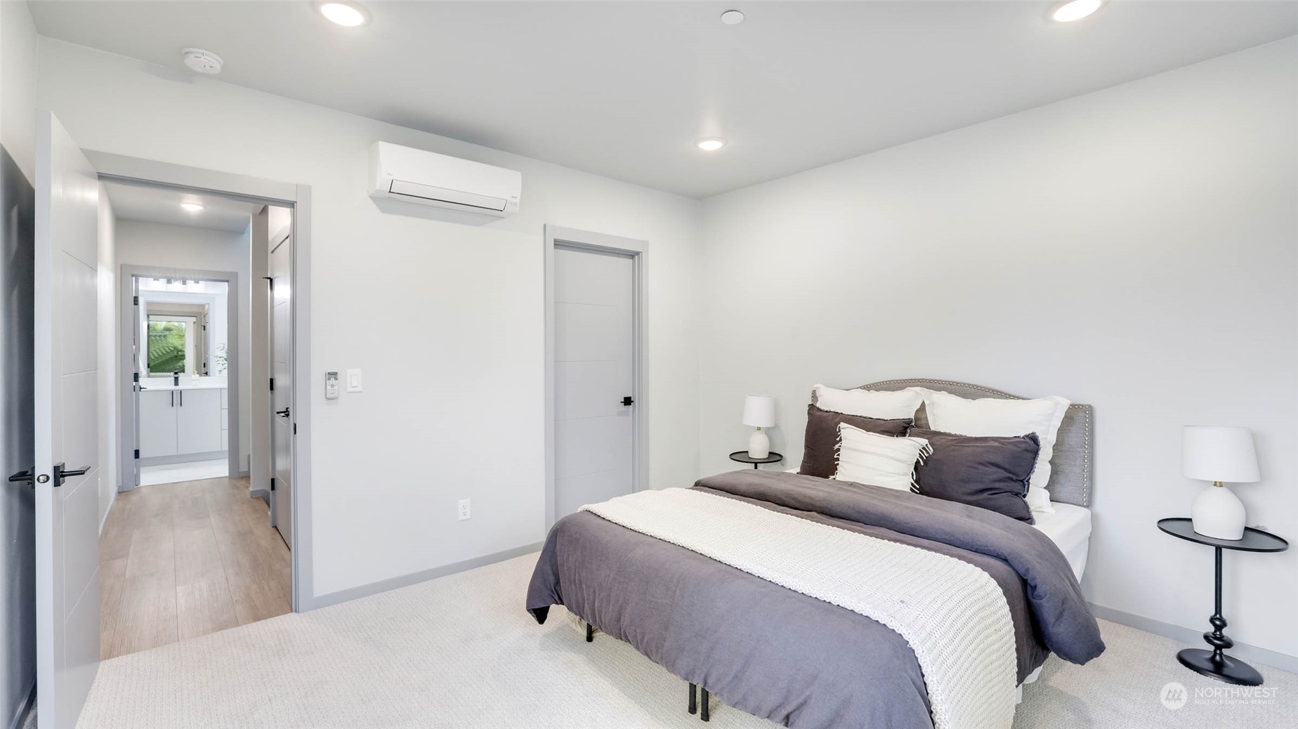 1713 14th Avenue South Seattle, WA 98144 - Photo 11 of 26 a bedroom with a bed and a mirror