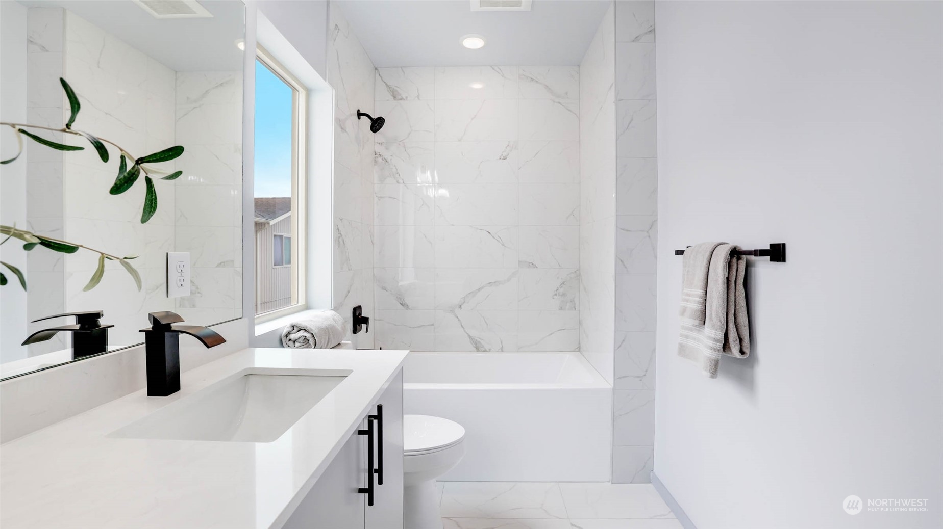1713 14th Avenue South Seattle, WA 98144 - Photo 13 of 26 a bathroom with a tub sink and mirror