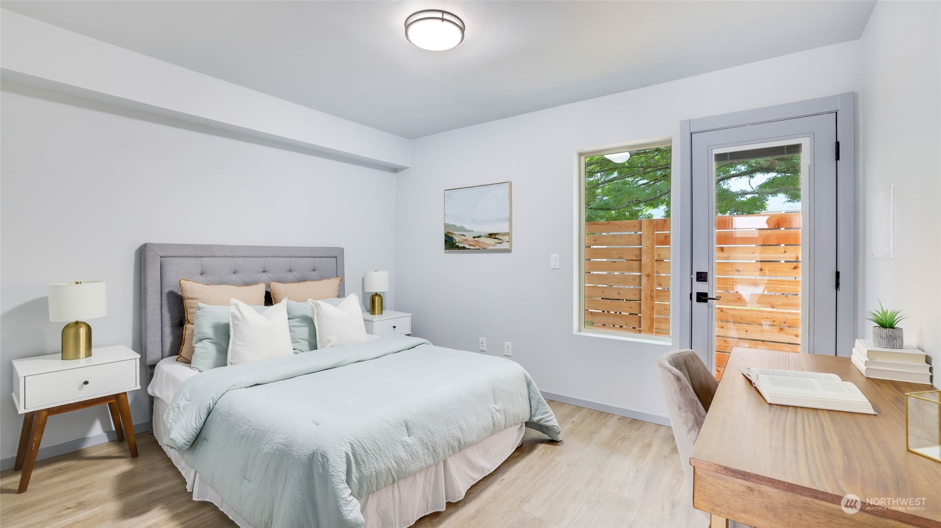 1713 14th Avenue South Seattle, WA 98144 - Photo 15 of 26 a bedroom with a bed and window