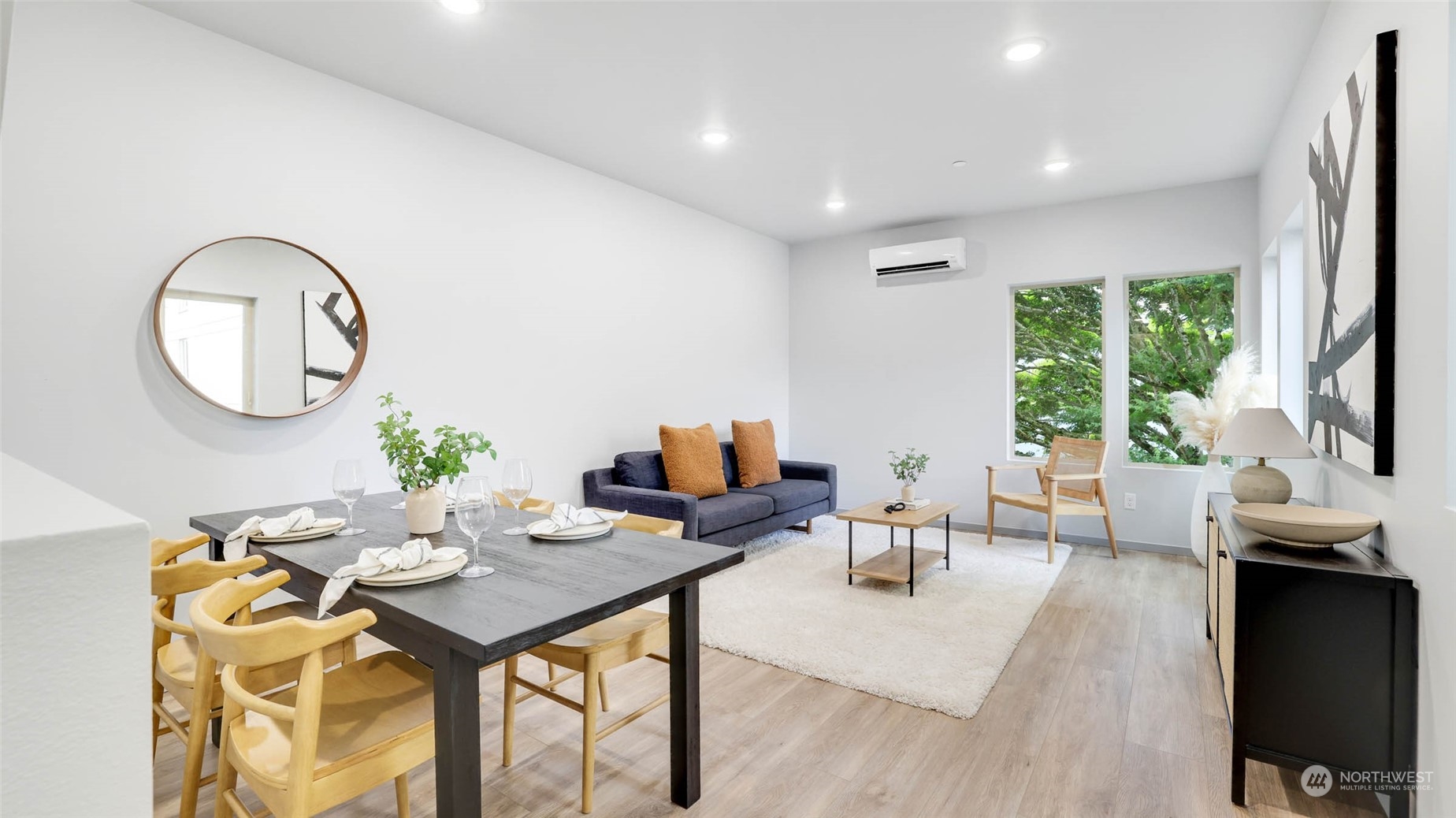 1713 14th Avenue South Seattle, WA 98144 - Photo 3 of 26 a living room with furniture a window and a dining table