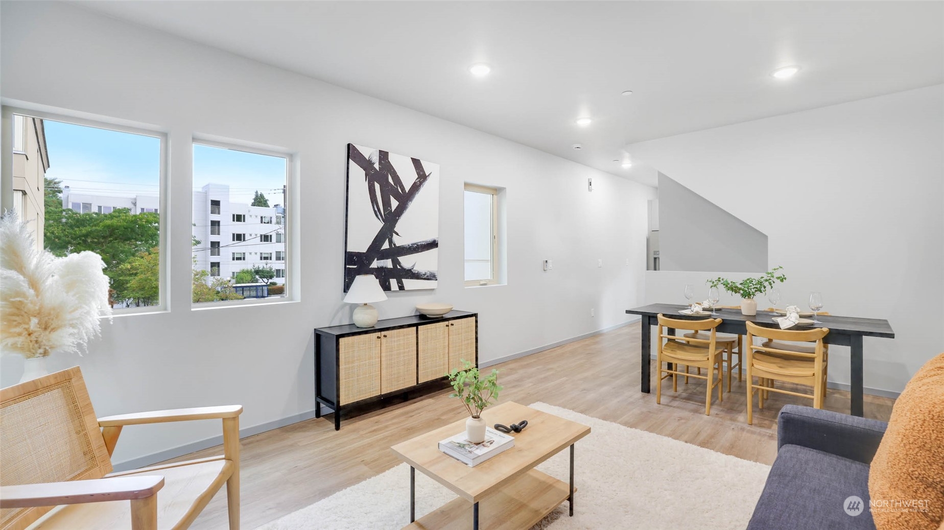 1713 14th Avenue South Seattle, WA 98144 - Photo 5 of 26 a living room with furniture a rug and white walls