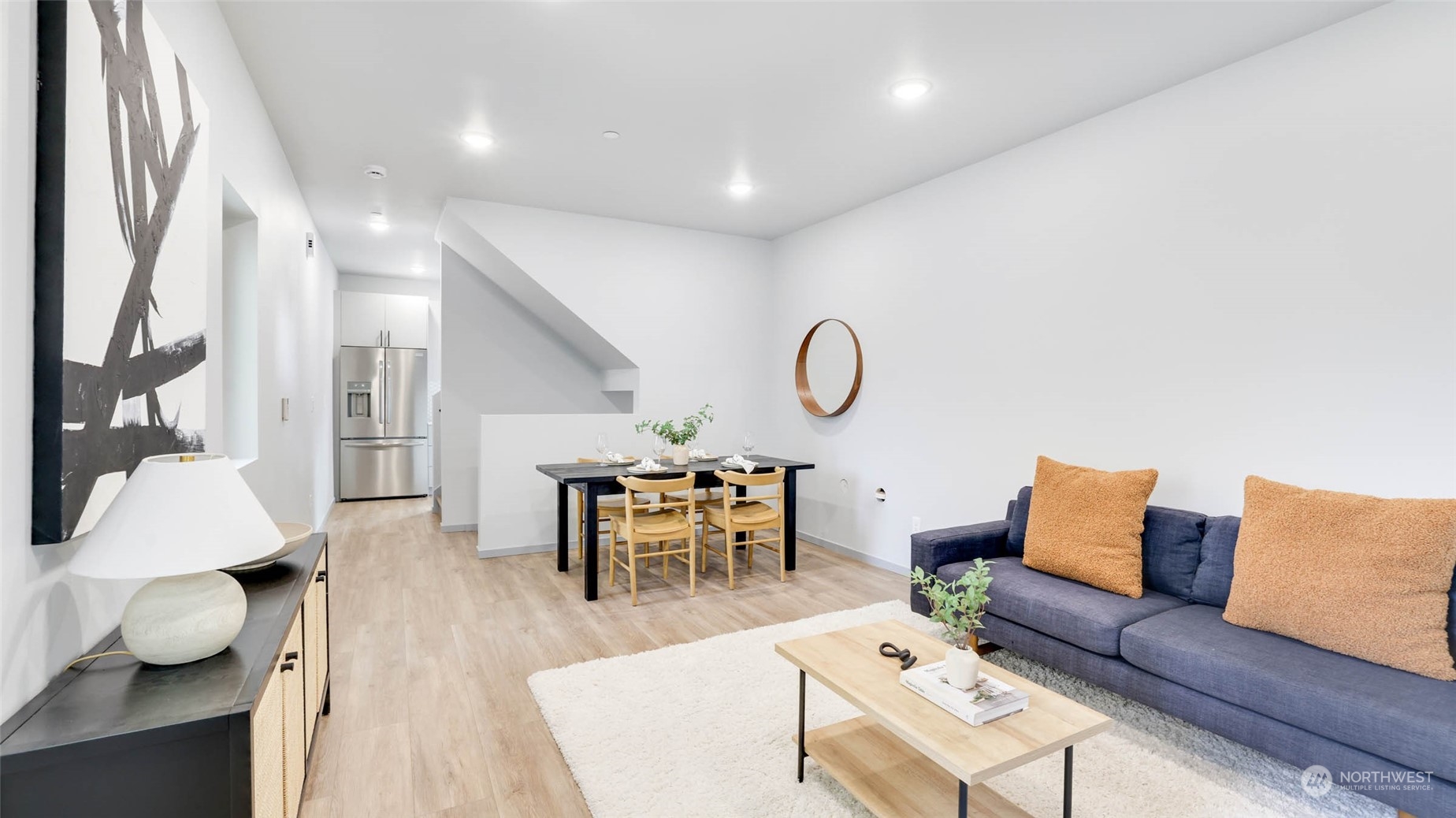 1713 14th Avenue South Seattle, WA 98144 - Photo 6 of 26 a living room with furniture and a wooden floor