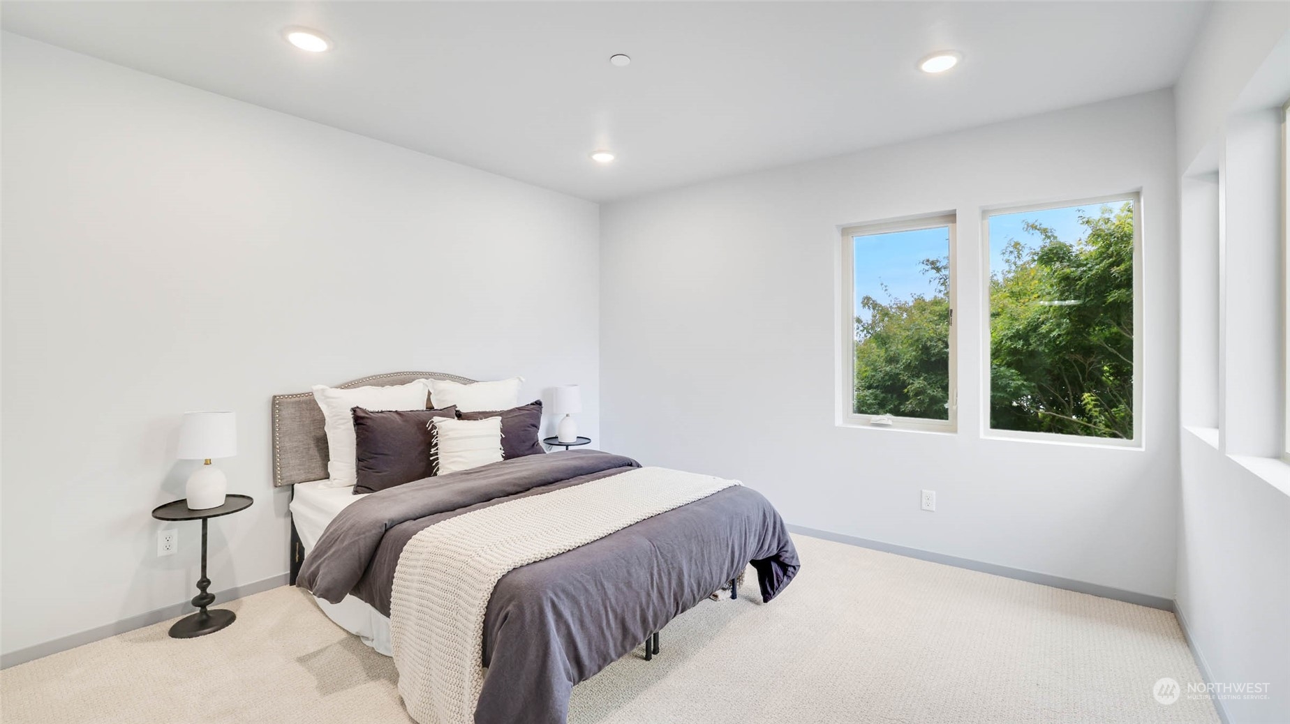 1713 14th Avenue South Seattle, WA 98144 - Photo 10 of 26 a bedroom with a bed and a window