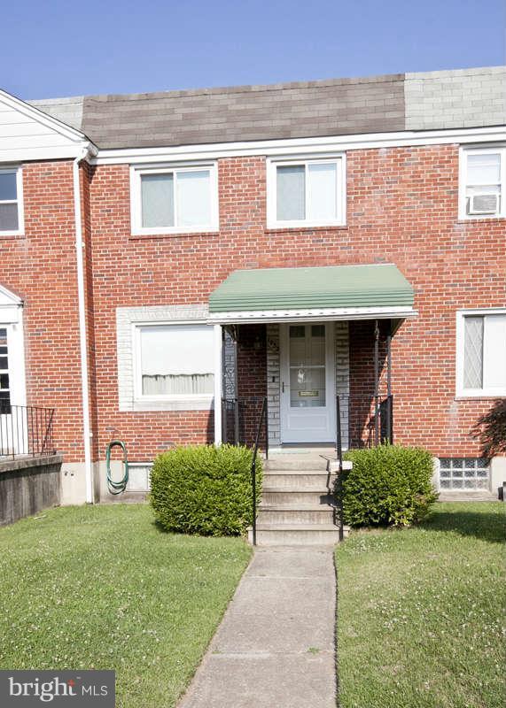 1932 Church Road Baltimore, MD 21222 - Photo 1 of 27 a view of a house with a yard