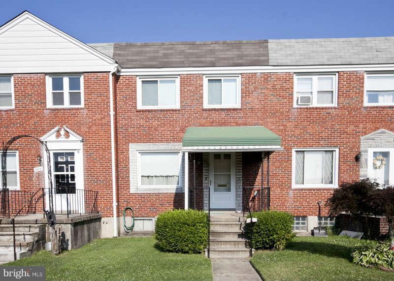 1932 Church Road Baltimore, MD 21222 - Photo 2 of 27 a front view of a house with yard