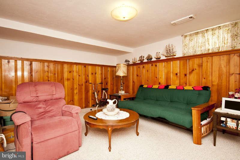 1932 Church Road Baltimore, MD 21222 - Photo 14 of 27 a living room with furniture and a window