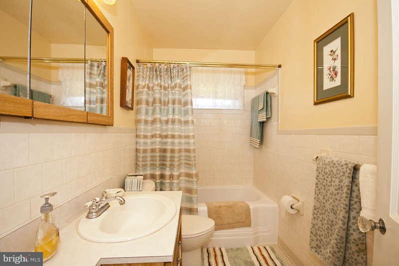 1932 Church Road Baltimore, MD 21222 - Photo 22 of 27 a bathroom with a sink and a shower