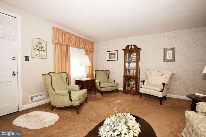 1932 Church Road Baltimore, MD 21222 - Photo 4 of 27 a living room with furniture and a couch
