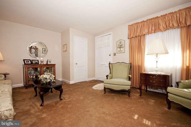 1932 Church Road Baltimore, MD 21222 - Photo 5 of 27 a living room with furniture and a chair