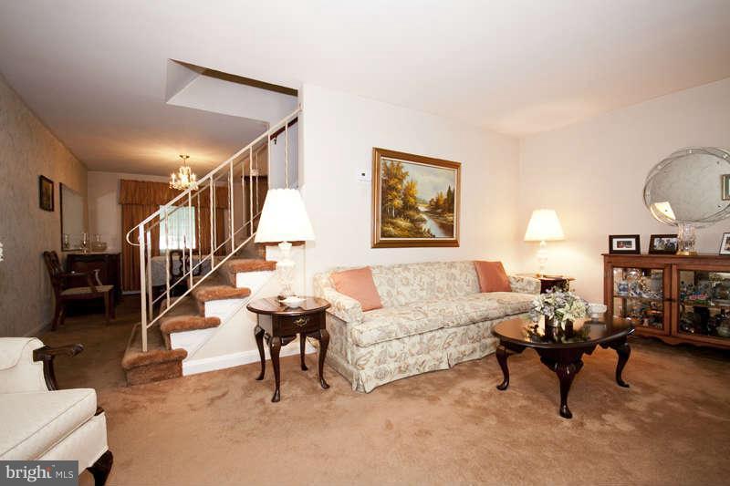 1932 Church Road Baltimore, MD 21222 - Photo 7 of 27 a living room with furniture and a stair