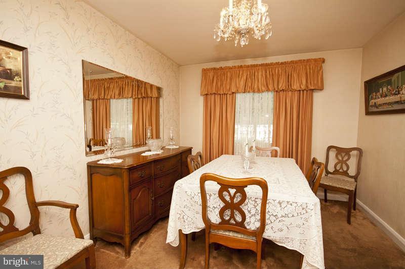 1932 Church Road Baltimore, MD 21222 - Photo 9 of 27 a dining room with furniture and window