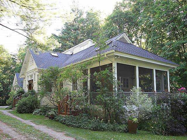 95 Kent Road South Cornwall, CT 06754 - Photo 1 of 1 a view of a house with brick walls and a tree