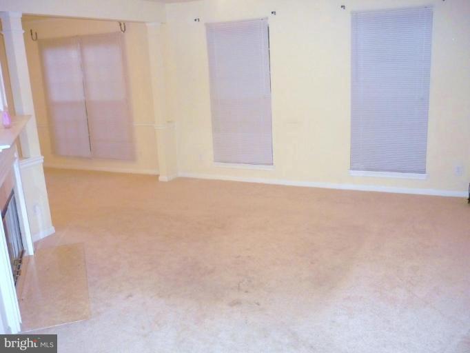 8214 Winstead Place, Unit 204 Manassas, VA 20109 - Photo 6 of 7 a view of an empty room
