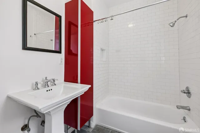 a bathroom with a sink and a bathtub