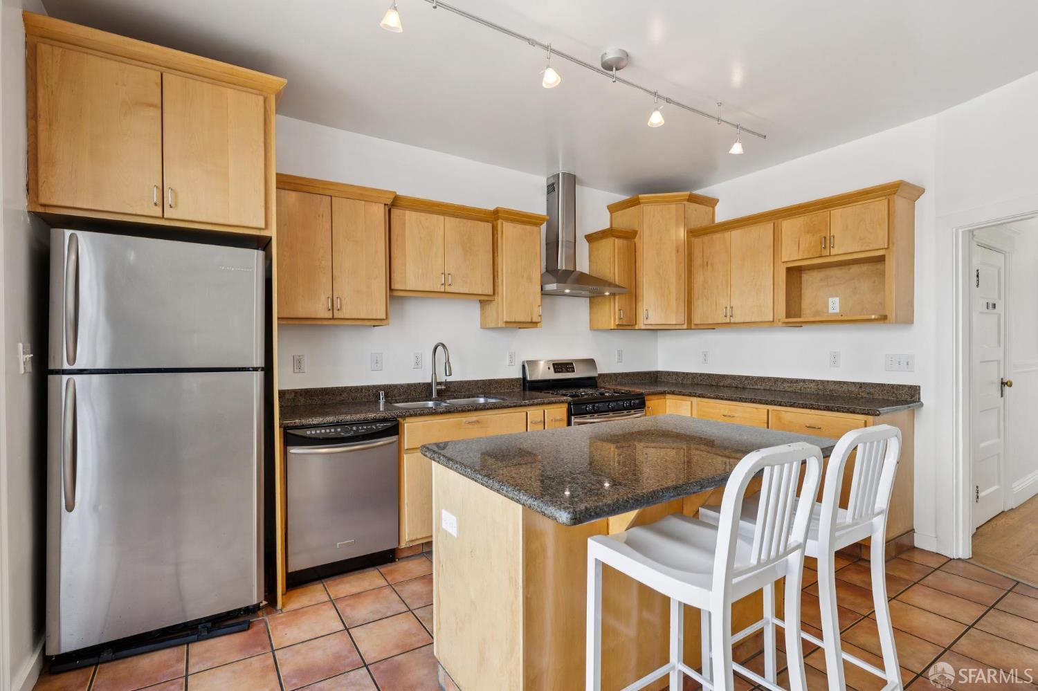984 Harrison Street San Francisco, CA 94107 - Photo 10 of 34 a kitchen with granite countertop a sink appliances a counter space and cabinets