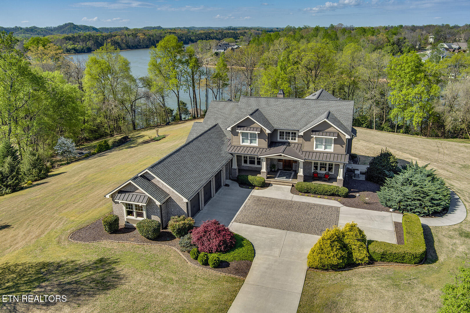 220 Thunder Road Vonore, TN 37885 - Photo 4 of 60 05_ThunderRoad_220_FrontRightElevated