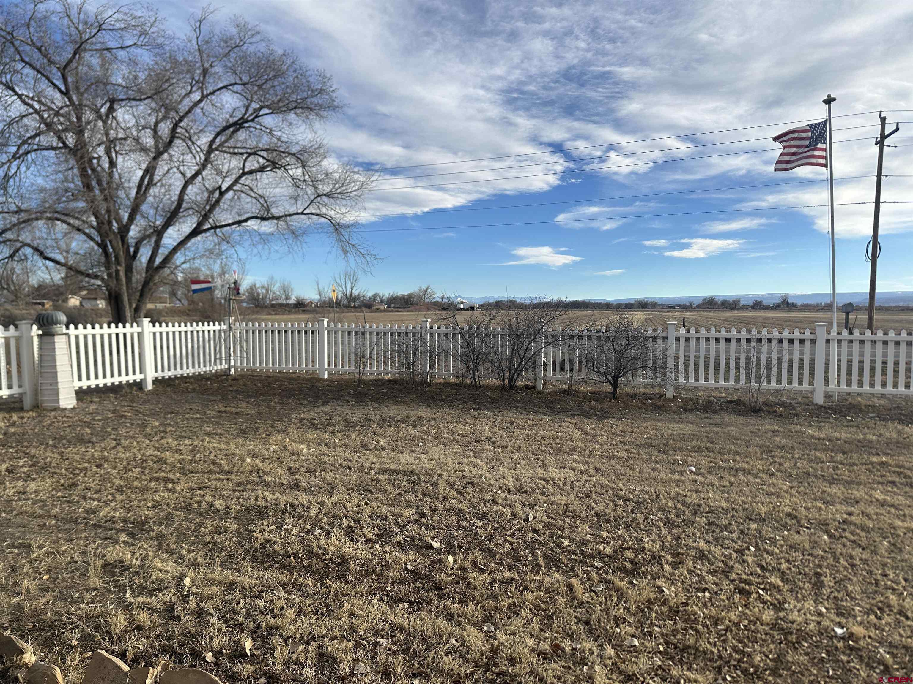 57001 Begonia Road Olathe, CO 81425 - Photo 12 of 37 a view of backyard with wooden fence