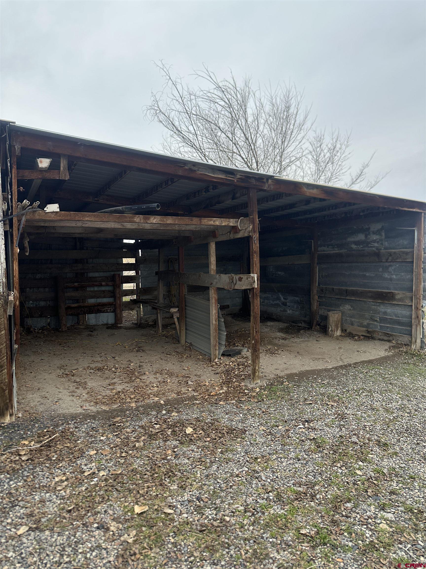 57001 Begonia Road Olathe, CO 81425 - Photo 7 of 37 a view of a house with a yard