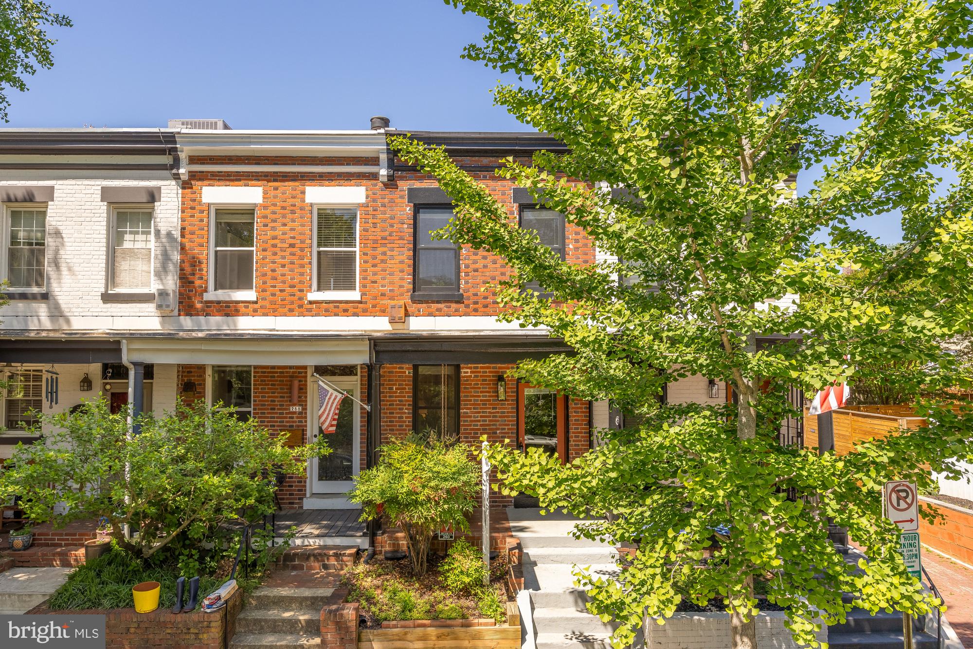 260 Warren Street Northeast Washington, DC 20002 - Photo 1 of 17 Charming brick home with lush greenery.