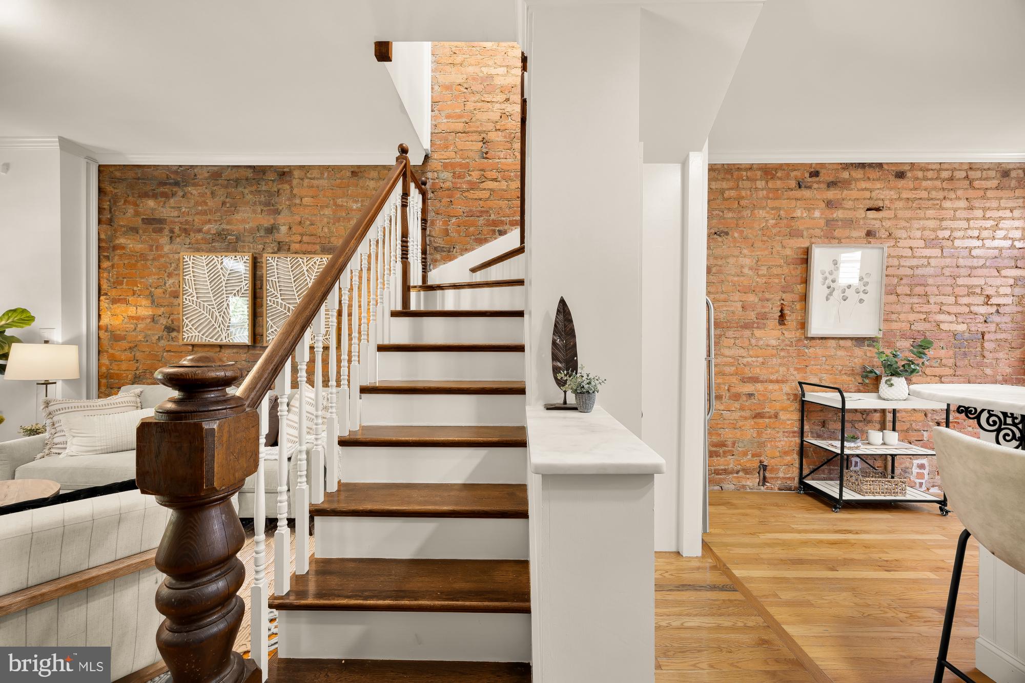 260 Warren Street Northeast Washington, DC 20002 - Photo 6 of 17 Charming staircase with exposed brick.
