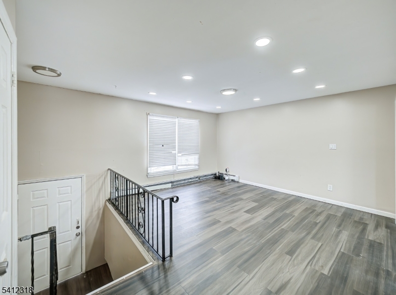 42 Mercer Street Carteret, NJ 07008 - Photo 15 of 35 a view of entryway with wooden floor