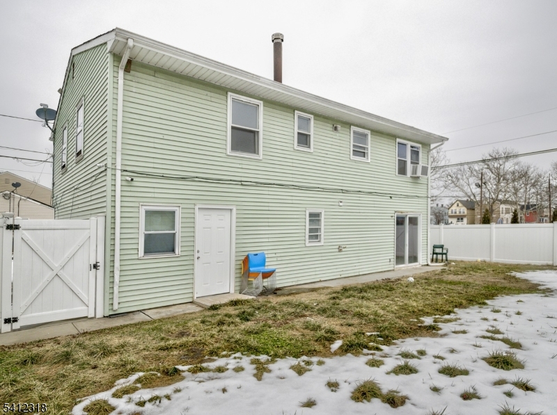 42 Mercer Street Carteret, NJ 07008 - Photo 4 of 35 a view of a house with a yard