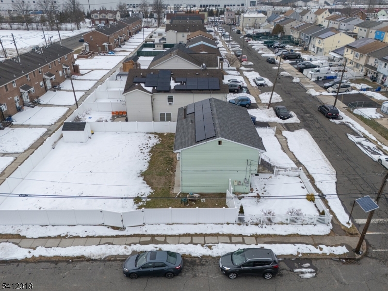 42 Mercer Street Carteret, NJ 07008 - Photo 9 of 35 an aerial view of a house with car parked