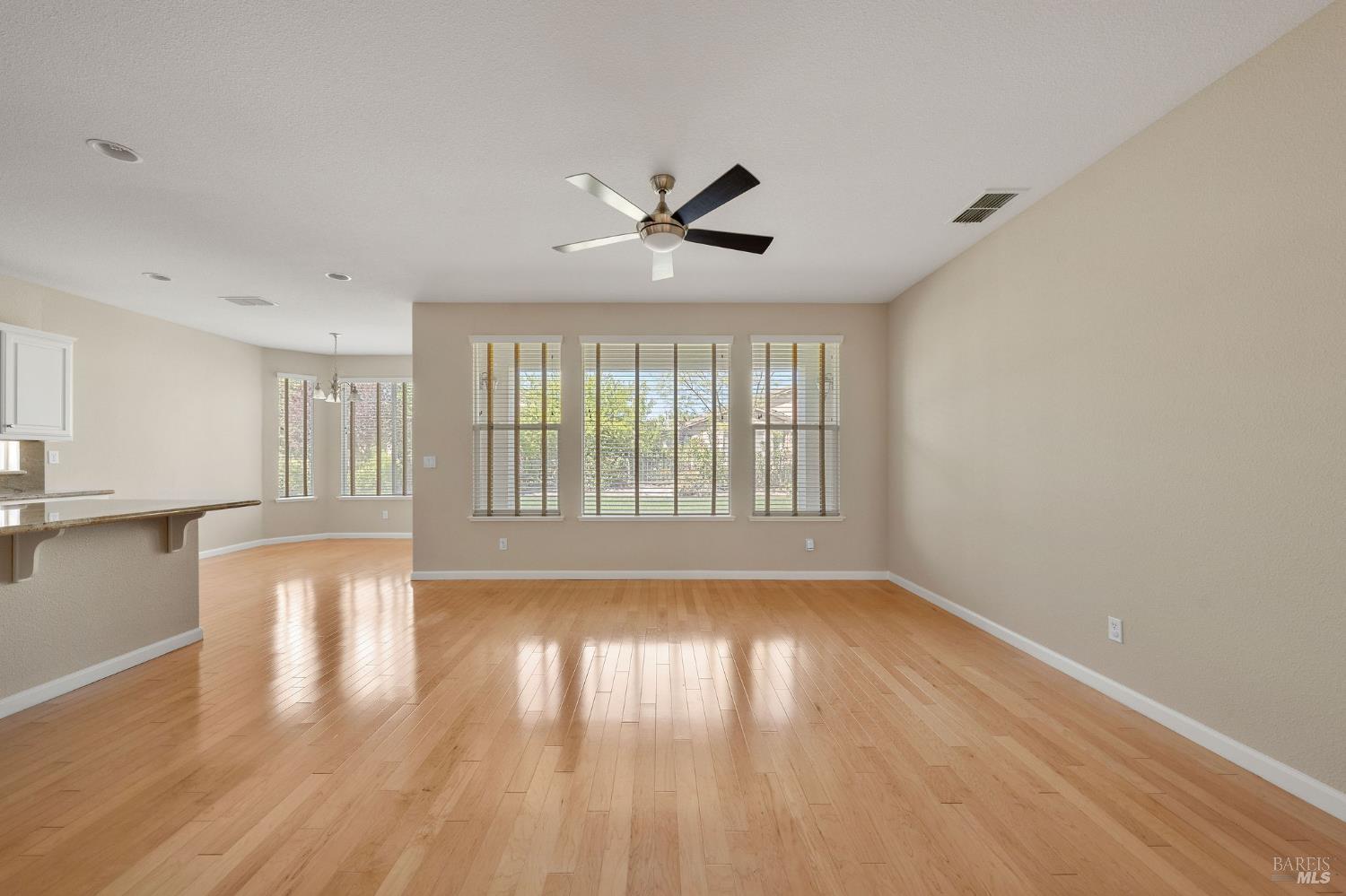 505 Marianna Place Rio Vista, CA 94571 - Photo 7 of 33 a view of empty room with wooden floor and fan