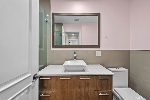 a bathroom with a sink and a toilet